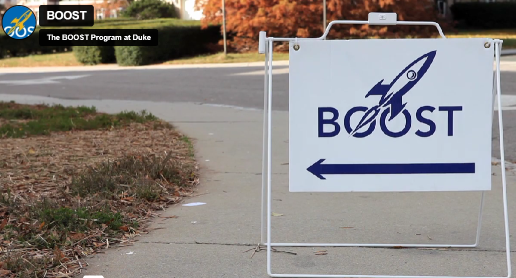 Sign that reads Boost and an arrow pointing to the meeting place